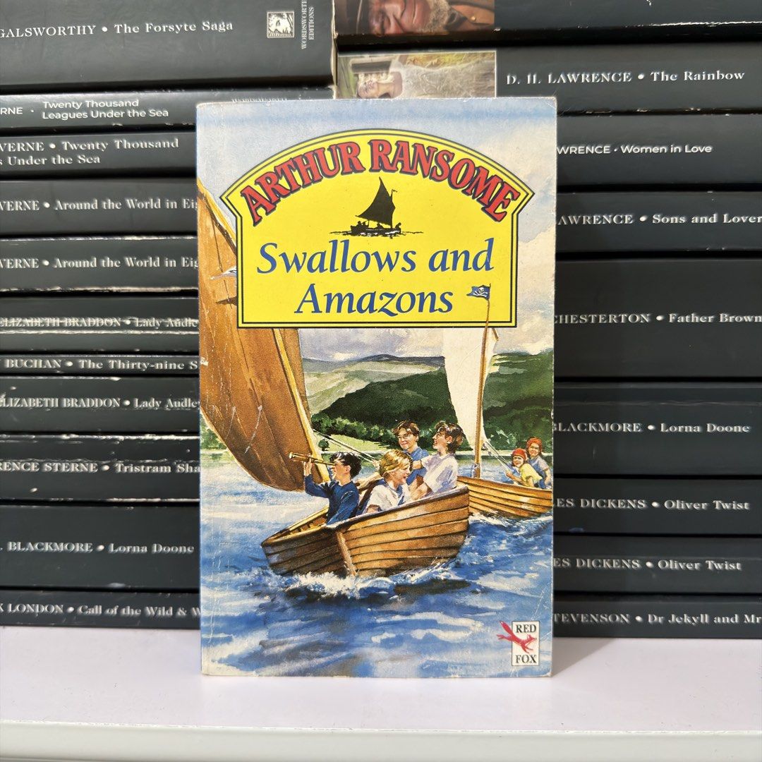 Swallows and Amazons by Arthur Ransome Red Fox Edition (Category: Storybooks) located in Lingayen. Submitted by readwjane (Listing ID 1470153217, Image 1). Description: - Title/Author: Classic children's adventure novel by Arthur Ransome - Edition: Paperback by Red Fox - Plot: Follow kids as they sail boats on a lake and camp out - Ideal For: Young adventurers and nostalgic book collectors - SF via J&T.