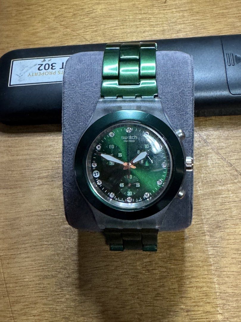 Swatch Chronograph Watch - Green, Red, Gold (Category: Women's Watches) located in Valenzuela. Submitted by wisetree_18aeb6 (Listing ID 1470183793, Image 3). Description: - Swiss-made Swatch chronograph watches: Green, Metallic Red, and Gold - Features stylish metal bracelets - Crystal accents on the green and gold watch dials - Reliable Swiss quartz movements - Minor scuffs on the clasps due to regular wear - Available for purchase as individual
