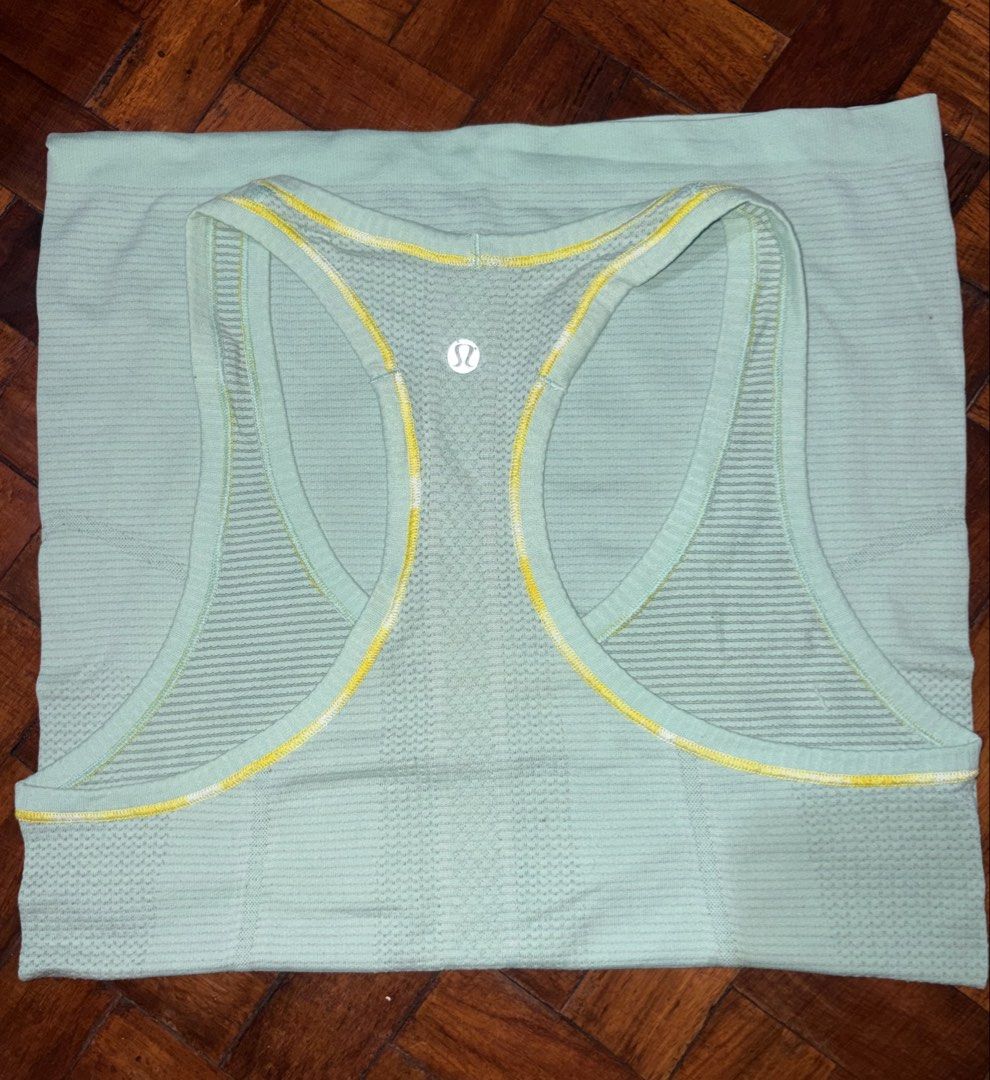 Swiftly Racerback w Yellow Seams (Category: Activewear) located in Marikina City. Submitted by lulul3mon (Listing ID 1470253675, Image 1). Description: Size 2, super light weight. Excellent for PH weather. Just have too many of the same style haha.