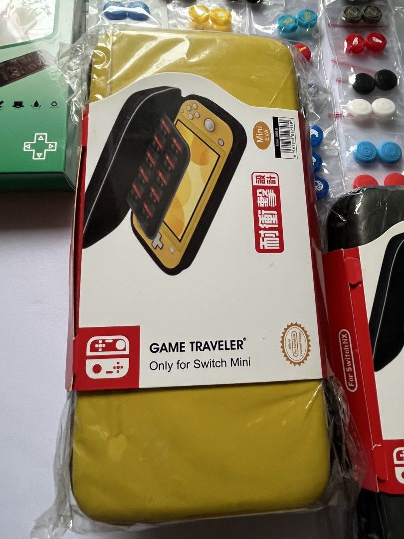 Switch poun in temperd glass (Category: Cases & Covers) located in Quezon City. Submitted by juhaire (Listing ID 1470292073, Image 2). Description: Available all brand new Switch lite pouch 300 desply available color Clear case 250 Pait thumb grip 100 Temperd glass 250.