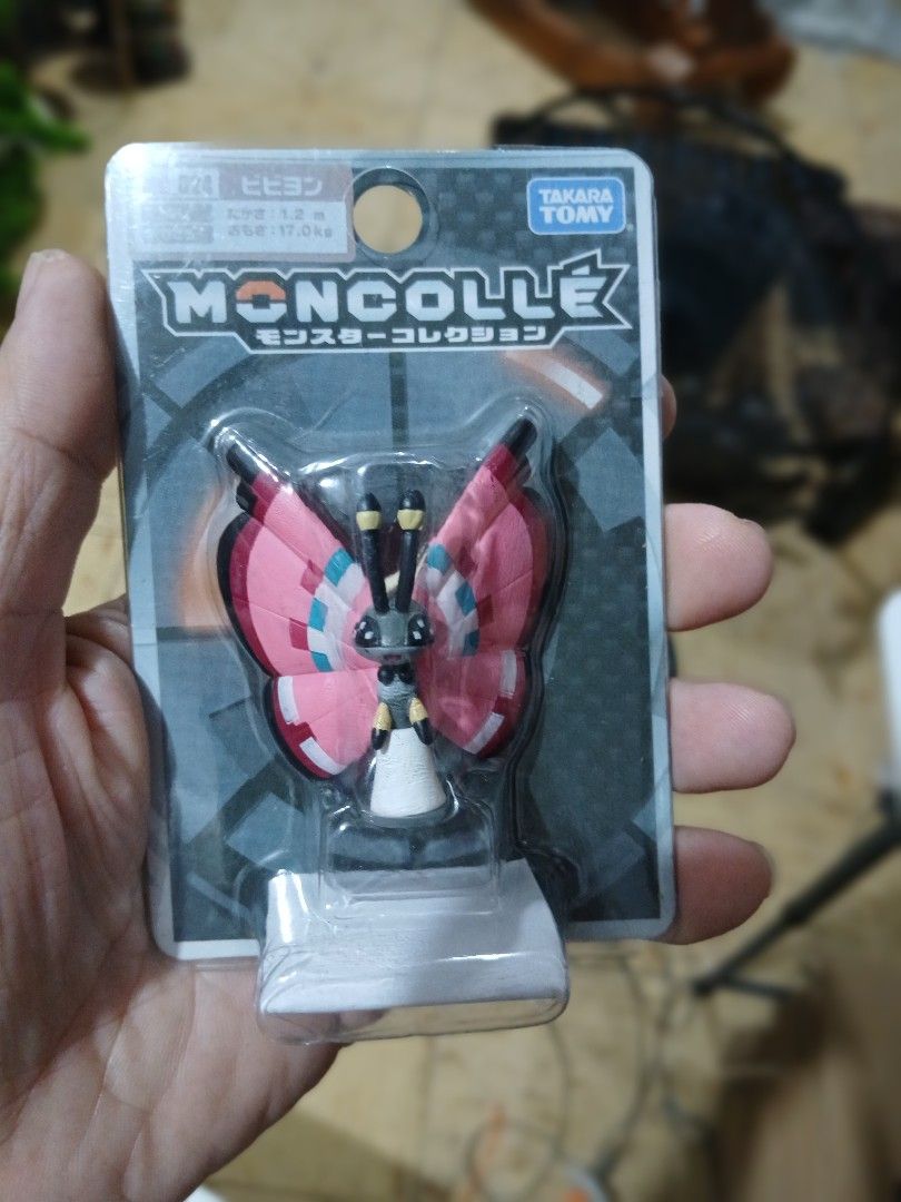 Takara Tomy Moncolle Vivillon Pokémon Figure (Category: Figurines & Statues) located in Caloocan City. Submitted by worthharveylee (Listing ID 1470153579, Image 1). Description: - Official Takara Tomy Moncolle Pokémon figurine - Character: Vivillon (Number 024) - Features pink wings with intricate pattern details - Condition: Brand new, unopened in original blister card - Clear plastic cover fully intact.