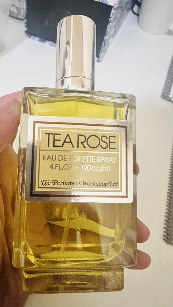 Tea Rose by The Perfumer's Workshop Eau de Toilette Spray 120ml (Category: Fragrance & Deodorants) located in Candelaria. Submitted by zillerortsac (Listing ID 1470215204, Image 2). Description: Original (USA Source) - Brand: The Perfumer's Workshop - Item: Tea Rose Eau de Toilette Spray - Volume: 4 fluid ounces / 120cc - Packaging: Includes original black and white striped box (minor shelf wear on corners) - Bottle: Clear glass with metallic sil