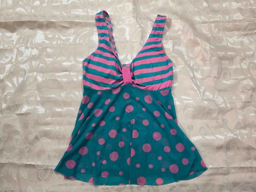 Teal & Pink Stripe Polka Dot Cami (Category: Sleeveless) located in Dagupan City. Submitted by drieinpink31 (Listing ID 1470295355, Image 1). Description: 🎀 DRIÉ IN PINK ITEM DETAILS • Issue/Flaw: None 📦 SHIPPING • J&T Express • Shipping fee: Shouldered by buyer 💳 PAYMENT • GCash • Maya • COD: Not available 📌 PLEASE NOTE Any issues/flaws will be stated and shown in the listing. Please check the photos and details carefully before purchasing. 