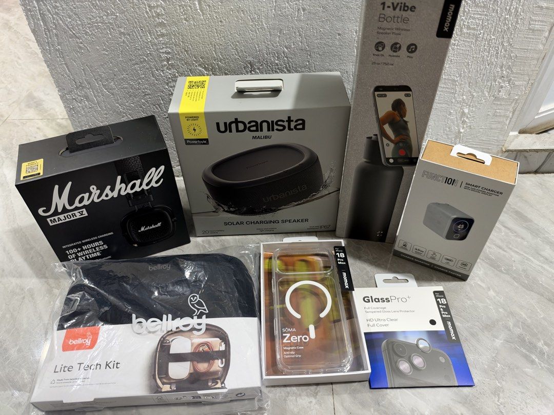 Tech and Lifestyle Bundle (Category: Headphones & Headsets) located in Manila. Submitted by catberries (Listing ID 1470211586, Image 1). Description: For sale! -Marshall Major V Wireless On-Ear Headphones -Urbanista Malibu Solar Charging Speaker -Bellroy Lite Tech Kit – Organizer Case / Travel Pouch -Momax 1-Vibe Bottle (Magnetic Wireless Speaker Flask) -Momax Function Smart Charger (45W / Digital Display) -Momax Soma Zero Magnetic Case & GlassPr