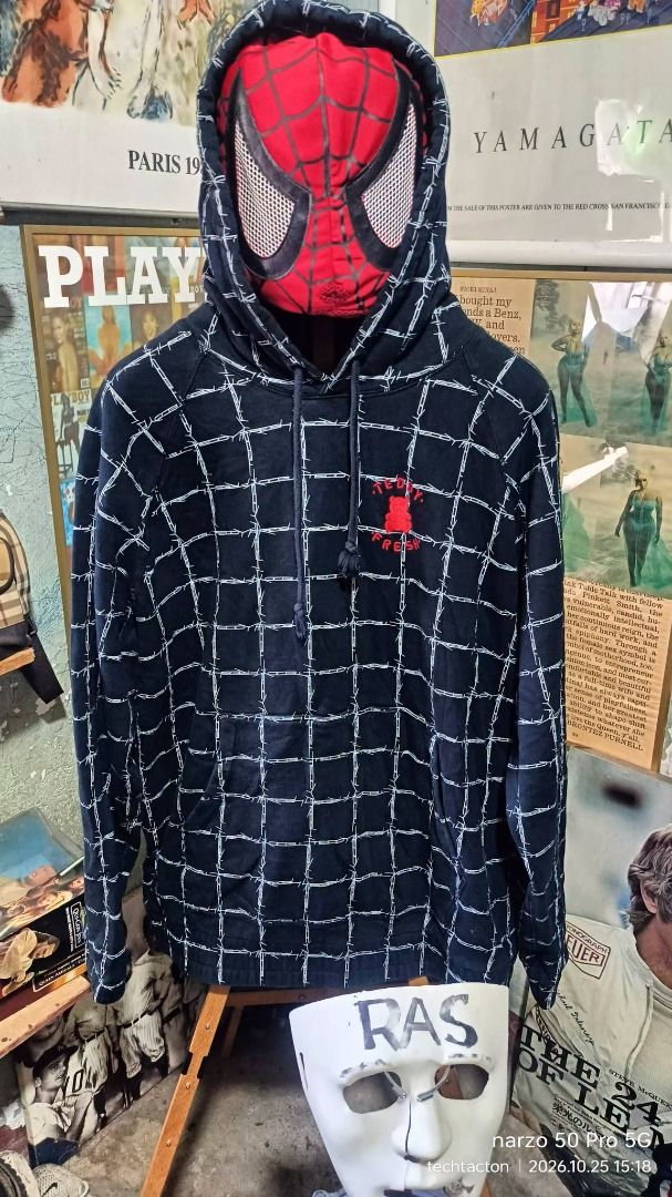 Teddy Fresh Black Barbed Wire Grid Hoodie (Category: Coats, Jackets and Outerwear) located in Santo Tomas. Submitted by pickers_corner (Listing ID 1470293873, Image 1). Description: TEDDY FRESH barbed wire grid Hoodie size L dime 23x28 excellent condition no issue - Brand: Teddy Fresh - Color: Black with white barbed wire grid pattern - Size: Large - Details: Embroidered red bear logo on left chest, drawstring hood with knotted cords - Material: 
