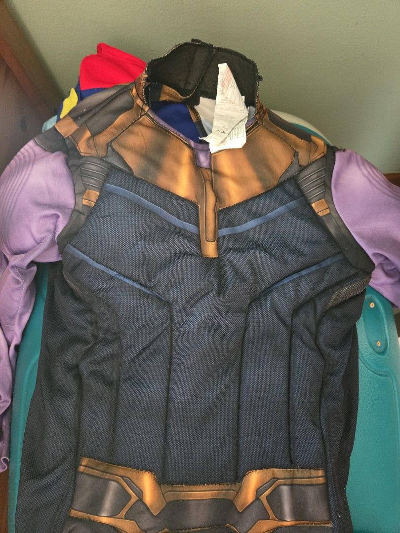 Thanos Costume Thanos Top Avengers Marvel (Category: Babies & Kids Fashion) located in Pasig City. Submitted by izzy0202 (Listing ID 1470144573, Image 3). Description: -6 to 8 Y Authentic Avengers Thanos costume top - Features iconic purple sleeves, gold and dark blue torso detailing, and built-in armor prints on the chest and shoulders - Brand new with tag attached near the collar - Ideal for Halloween, cosplay events, and themed parties - Fits 