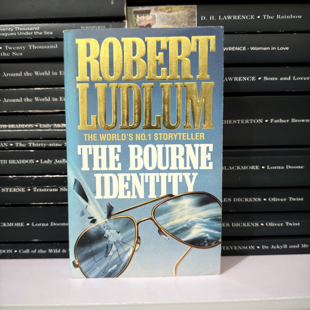 The Bourne Identity by Robert Ludlum paperback (Category: Storybooks) located in Lingayen. Submitted by readwjane (Listing ID 1470199136, Image 1). Description: - Title: Classic Thriller Novel by Robert Ludlum - Edition: Paperback with the iconic broken sunglasses cover design - Condition: Pages inside are clean and ready to read - Genre: Suspense and spy fiction - Perfect for: Thriller book lovers and collectors.