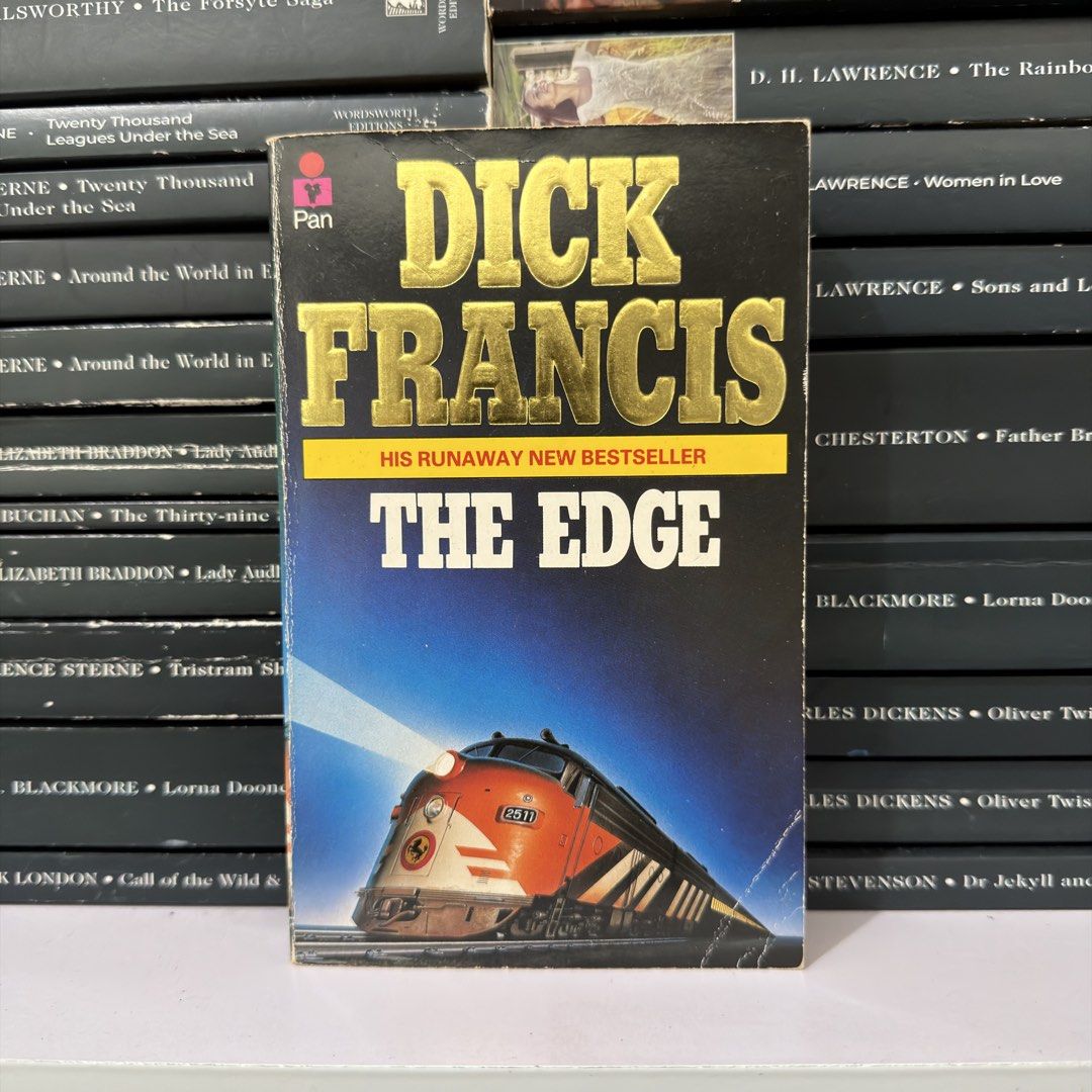 The Edge by Dick Francis Pan Paperback Novel (Category: Storybooks) located in Lingayen. Submitted by readwjane (Listing ID 1470198849, Image 2). Description: - Title & Author: The Edge by Dick Francis - Format: Vintage paperback with iconic train cover art - Publisher: Pan Books - Genre: Mystery and horse racing fiction - Condition: Pages intact, with moderate shelf wear on edges and spine from reading and storage.