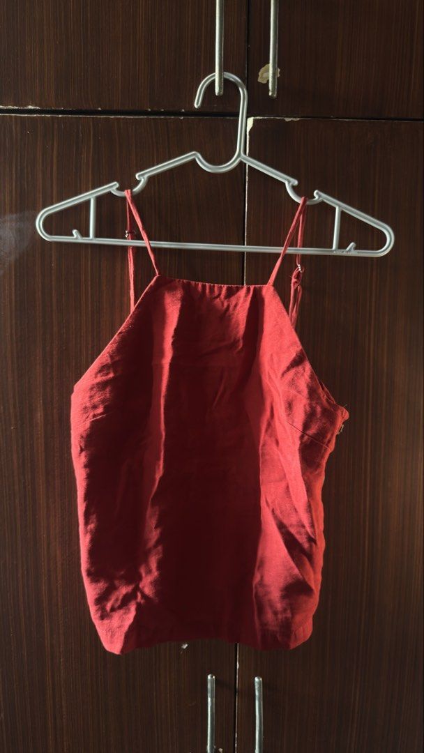 The Editor's Market Top (Category: Sleeveless) located in Las Pinas. Submitted by crlne (Listing ID 1470230733, Image 1). Description: - Brand: The Editor's Market - Size: XS - Color: Red - Design: Square neckline, thin adjustable straps, and side button placket with four brown buttons - Fabric: Lightweight, ideal for warm weather or layering - Condition: Minor wear near the arm opening, otherwise clean and ready to wear.