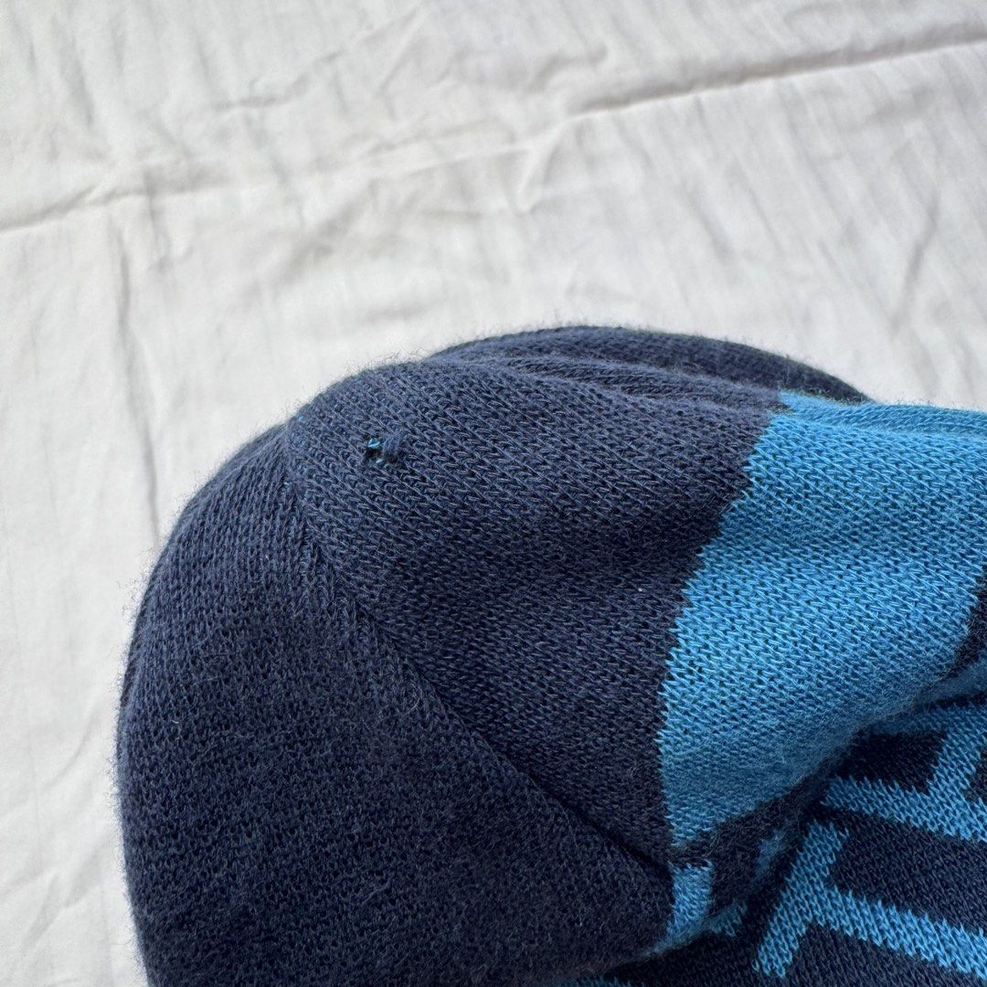 THE NORTH FACE (Category: Beanies) located in Pasig City. Submitted by jaaard (Listing ID 1470320783, Image 3). Description: Tnf beanie Small pinhole issue see last pic Pm me.