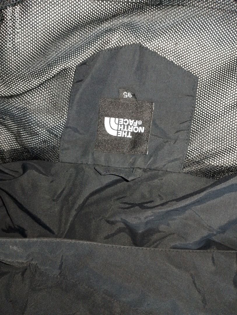 The North Face Black Hooded Waterproof Jacket (Category: Coats, Jackets and Outerwear) located in General Santos City (Dadiangas). Submitted by peter_diaz1029 (Listing ID 1470181741, Image 3). Description: - Brand: The North Face - Color: Solid Black with White Embroidered Logo (chest and back shoulder) - Closure: Full zip front - Pockets: Dual front pockets with flaps - Hood: Attached with adjustable drawstrings - Cuffs: Adjustable velcro straps