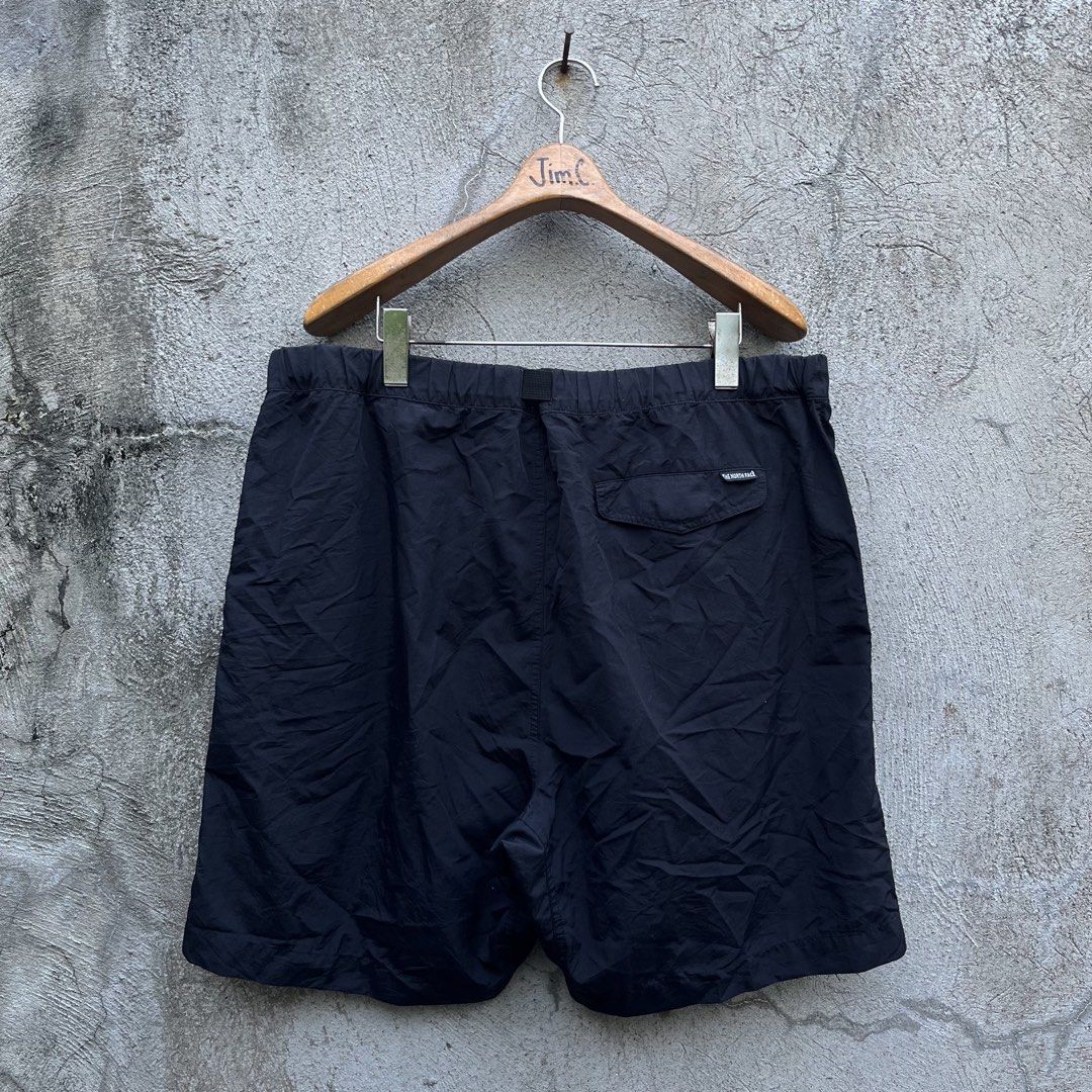 The North Face Black Nylon Shorts (Category: Shorts) located in Davao. Submitted by streetsight (Listing ID 1470298612, Image 3). Description: - Brand: The North Face - Color: Classic Black - Material: Lightweight, durable nylon - Fit: Comfortable elastic waistband with built-in adjustable webbing belt and buckle - Pockets: Two front hand pockets and one back pocket with secure button flap - Details: Embroidered TNF logo near the left hem and on 