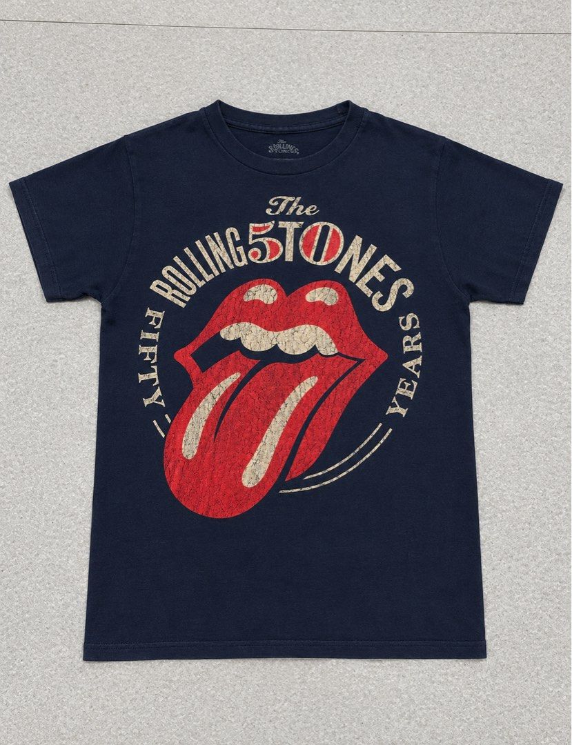 The Rolling Stones Fifty Years Tee (Category: Tshirts & Polo Shirts ) located in Manila. Submitted by fcaleb022713960 (Listing ID 1466419885, Image 1). Description: - Official Rolling Stones 50th Anniversary tour t-shirt - Iconic tongue logo graphic printed across the chest - Color: Blue with a faded vintage look - Material: Soft, comfortable cotton - W 18 - L 24 - Condition: Solid, worn only a few times .