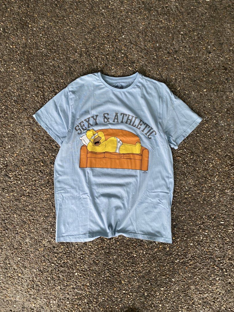 The Simpsons “Sexy & Athletic” Shirt (Category: Tshirts & Polo Shirts ) located in Caloocan City. Submitted by webspot (Listing ID 1470226062, Image 1). Description: The Simpsons “Sexy & Athletic” Shirt Size - L Width - 21 Length - 28.