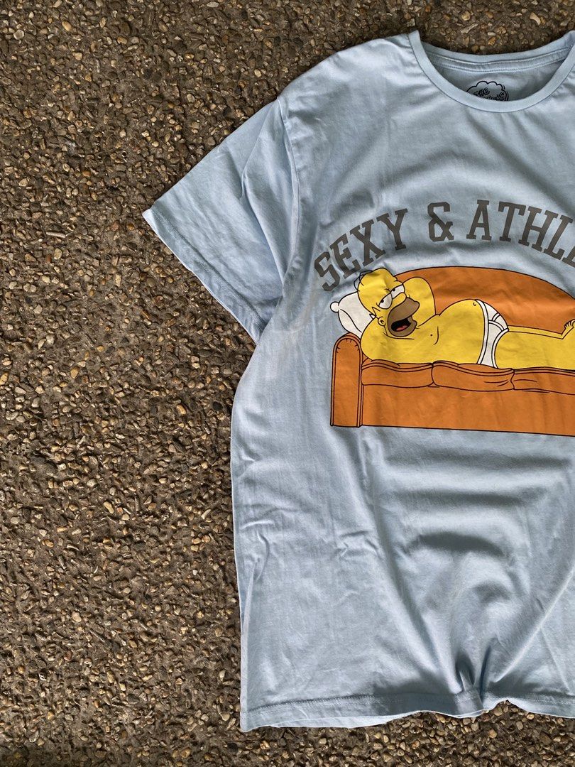 The Simpsons “Sexy & Athletic” Shirt (Category: Tshirts & Polo Shirts ) located in Caloocan City. Submitted by webspot (Listing ID 1470226062, Image 2). Description: The Simpsons “Sexy & Athletic” Shirt Size - L Width - 21 Length - 28.