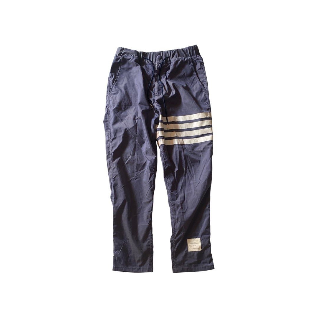 Thom Browne 4 Bar Track Pants (Category: Joggers) located in Manila. Submitted by finofindthisart (Listing ID 1470253143, Image 1). Description: Length 37 Waist 32-34 Hem y Measured it by inches Issue: N/A This is a pre-loved/thrifted items and may show minor signs of issue due to its vintage nature. Kindly manage expectations. No refunds or exchanges will be accepted. 📍Pasay City DM for inquiries..