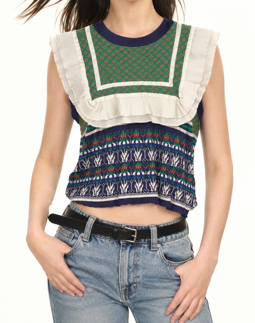 [THRIFTED & AVAILABLE] Multicolored Patterned Knitted Sweater Vest (Category: Sleeveless) located in Quezon City. Submitted by yaku1t (Listing ID 1470189717, Image 1). Description: SHIPPING FROM QUEZON CITY. Kindly, read the caption and the bio for some house rules. Swipe right for the close-up pictures. Item is thrifted, please, manage expectations. - Free Size (best fits M) - Geometric green top section with colorful tribal-style print on the l