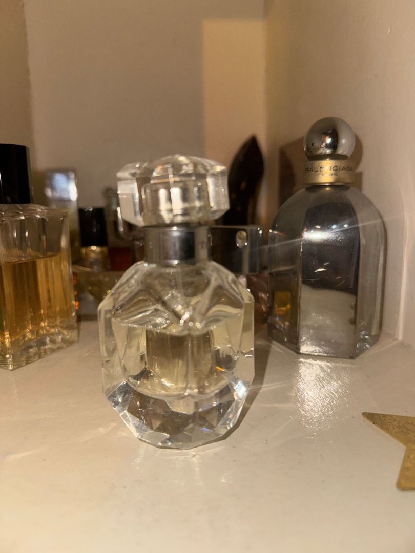 Tiffany & Co Sheer Eau de Parfum 50ML (Category: Fragrance & Deodorants) located in Cebu City. Submitted by _t.rix (Listing ID 1470180834, Image 1). Description: - Authentic Tiffany & Co fragrance bottle - Gorgeous diamond-cut design with branded silver collar - Includes original faceted glass cap - Around 70% full (fluid line visible) .