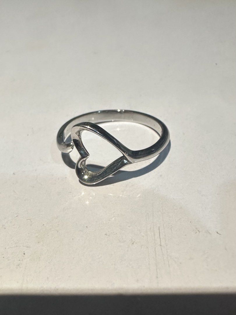 Tiffany And Co Open Heart Ring Size 7.25 (Category: Rings) located in Mandaluyong City. Submitted by chyckenwings (Listing ID 1470301200, Image 1). Description: SALE! As is where is. First to pay gets the item. No long reservations. Location is in Mandaluyong. Kindly note: Unless stated, items listed have not been tested and are sold as is where is. We source our products from a variety of auctions. While some items may look brand new, all are li