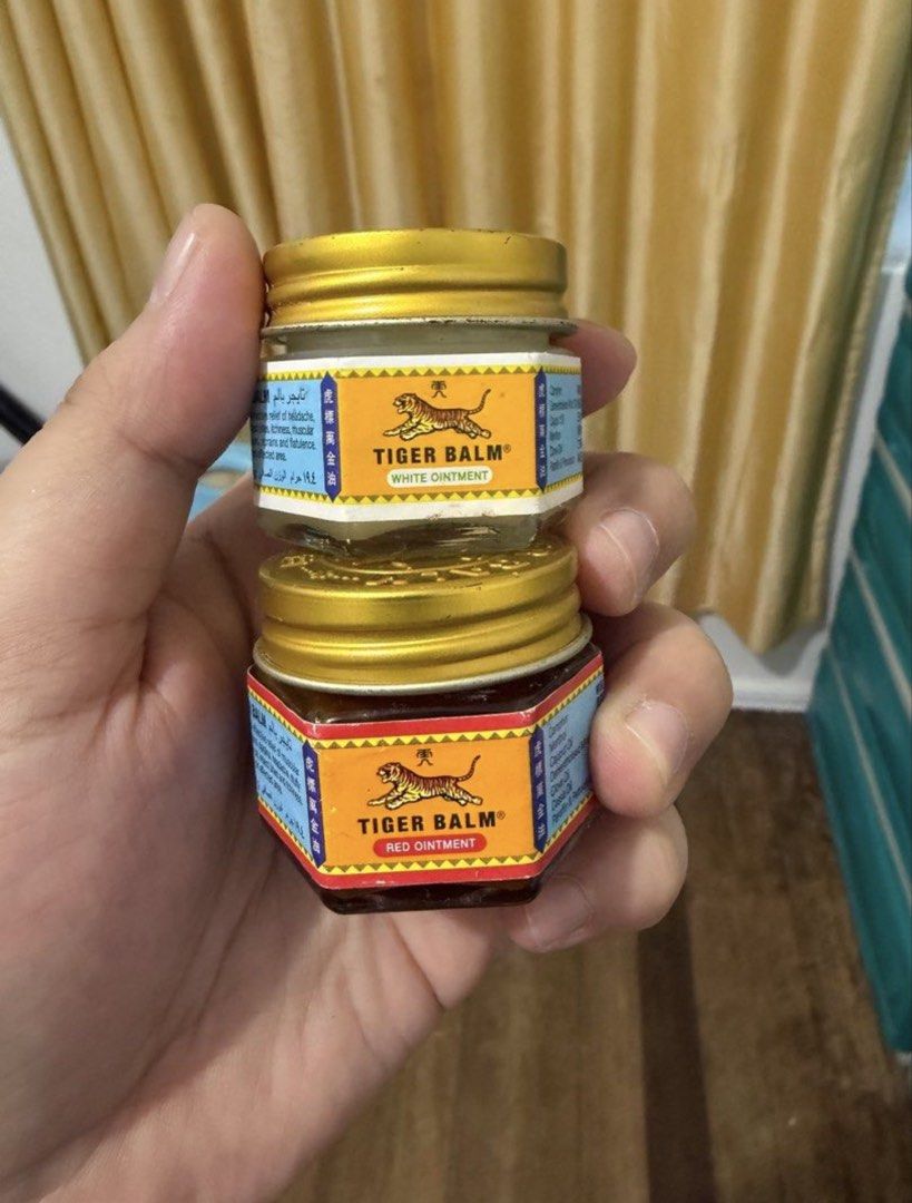 Tiger Balm White and Red Ointment Set (Category: Body Care) located in Binan City. Submitted by prelovedlagunaph (Listing ID 1470171738, Image 1). Description: - Bundle of 2 Tiger Balm glass jars: 1 White Ointment and 1 Red Ointment - 100% brand new, unopened, and factory-sealed - Fresh stock: White balm manufactured Feb 2025, expires Oct 2029 (Red balm expiry stamped on base) - Trusted herbal remedy for fast relief from muscle aches, body tensio