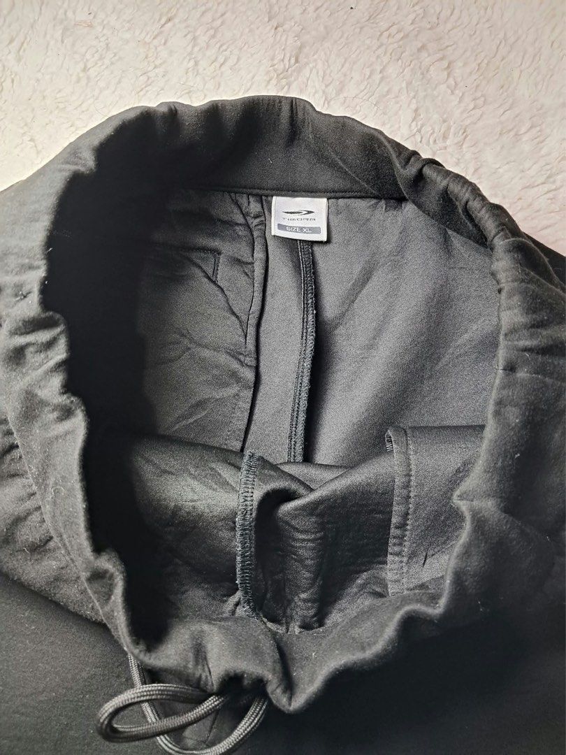 Tigora Black Tech Sweatpants Joggers Size XL (Category: Joggers) located in Baguio. Submitted by padisellsz (Listing ID 1470272484, Image 3). Description: - Brand: Tigora - Style: Tech sweatpants / joggers - Very good condition - No issues - Color: Solid black - Size: XL - Fit & Comfort: Elastic waistband with adjustable drawstring and ribbed ankle cuffs - Storage: Convenient zippered pockets to keep your items secure - parang 1 side cargo. May z