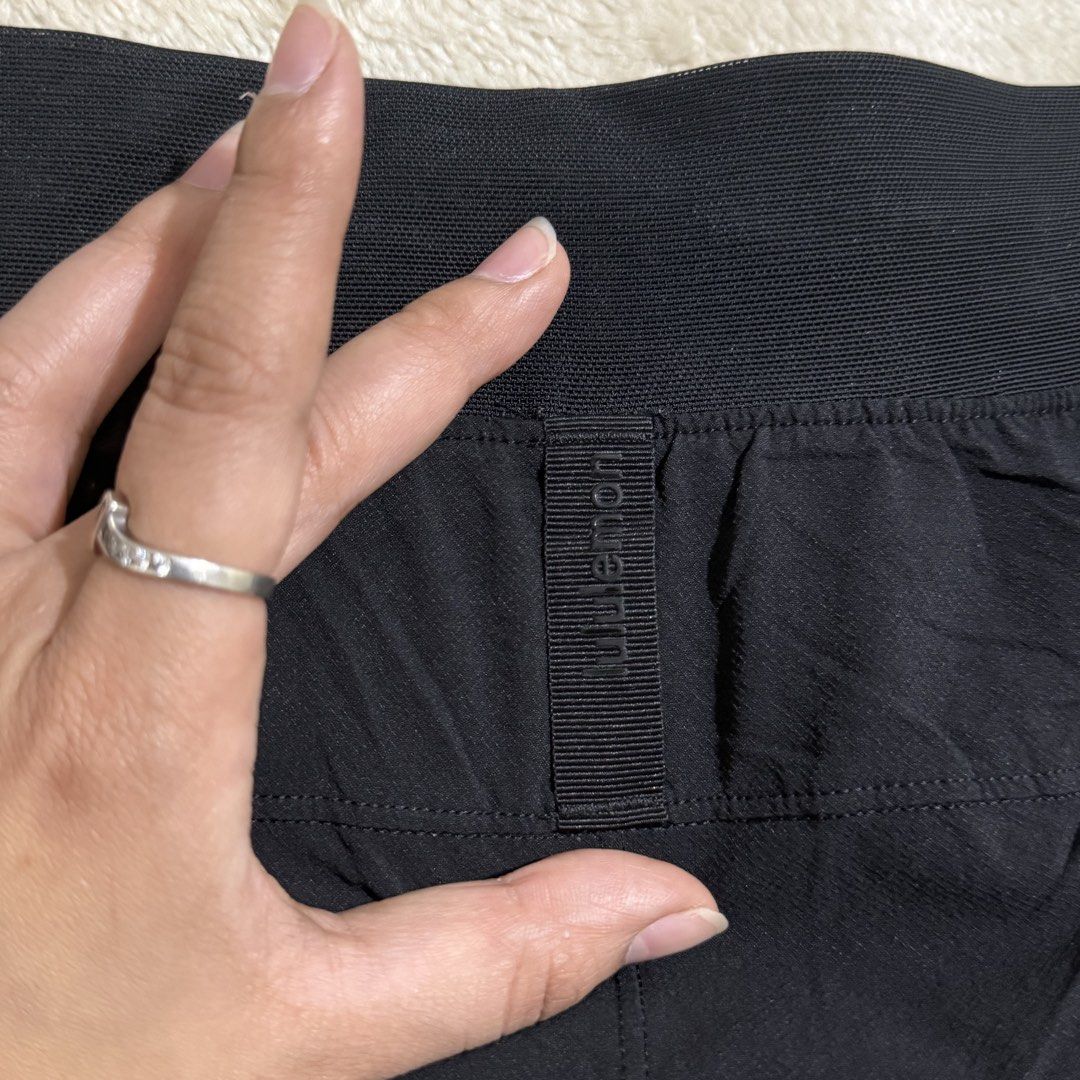 Lululemon Black Running Shorts with Zip Pockets – Dot 8 (Category: Activewear) located in Pasay City. Submitted by bellita_05 (Listing ID 1470272761, Image 3). Description: Black Lululemon athletic shorts 🖤 Perfect for running, gym workouts, training, and everyday wear. IT HAS THIS CUTE POCKET INSIDE THE POCKET! ✨ Signature Lululemon logo ✨ Elasticated waistband with adjustable drawstring ✨ Zippered pockets to keep essentials secure ✨ Lightweigh