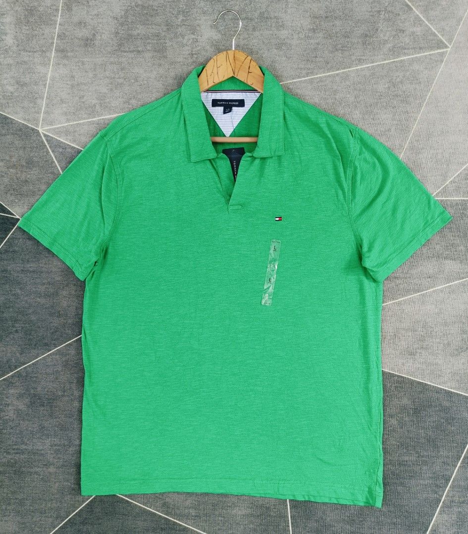 Tommy Hilfiger Polo (Authentic) (Category: Tshirts & Polo Shirts ) located in Cebu City. Submitted by renzecamingay (Listing ID 1470238952, Image 1). Description: Tommy Hilfiger Polo Good as New Large on Tag Width 22 Length 29 1250 Plus ship Only Thank you and GOD bless ☺️.