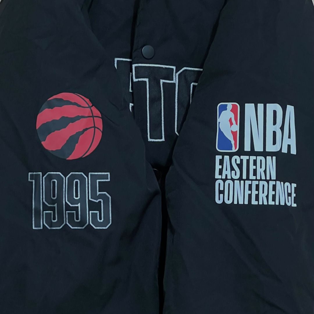 Toronto Raptors NBA Bomber Jacket Black Size S (Category: Coats, Jackets and Outerwear) located in Manila. Submitted by luxurybagsandshoes (Listing ID 1470232231, Image 2). Description: - Item: Brand New Toronto Raptors Varsity Jacket - Size: Small (with original tags attached) - Closure & Trim: Snap-button front with striped collar, cuffs, and hem - Design Details: Embroidered 'RAPTORS' lettering on the chest and a large graphic on the back - Sp