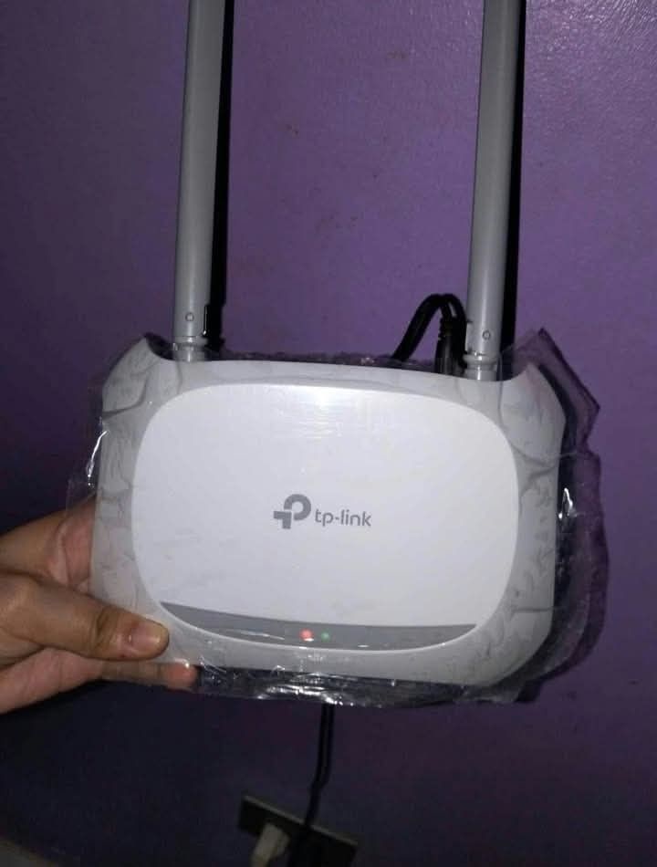 TP-Link 300Mbps Wireless N Router (Category: Networking) located in Marikina City. Submitted by rareocean_9df934 (Listing ID 1470245497, Image 2). Description: - Model: TP-Link 300Mbps Wireless N Router - Condition: Fully operational, like-new with plastic wrap still partially attached - Inclusions: Main unit, two external antennas, power adapter, and original box - Compatibility: Standard Philippine power plug - Status: Ready for quick setup and