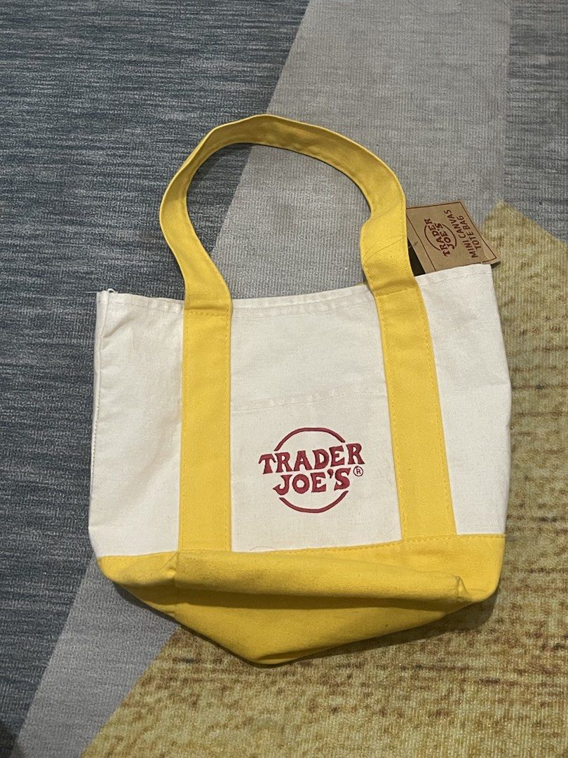 Trader Joe's Mini Canvas Tote Bag Yellow (Category: Tote Bags) located in Marikina City. Submitted by caseydreyes (Listing ID 1470228286, Image 1). Description: - brand new, bought this in the US! - issue: minimal pink mark on the second pic.