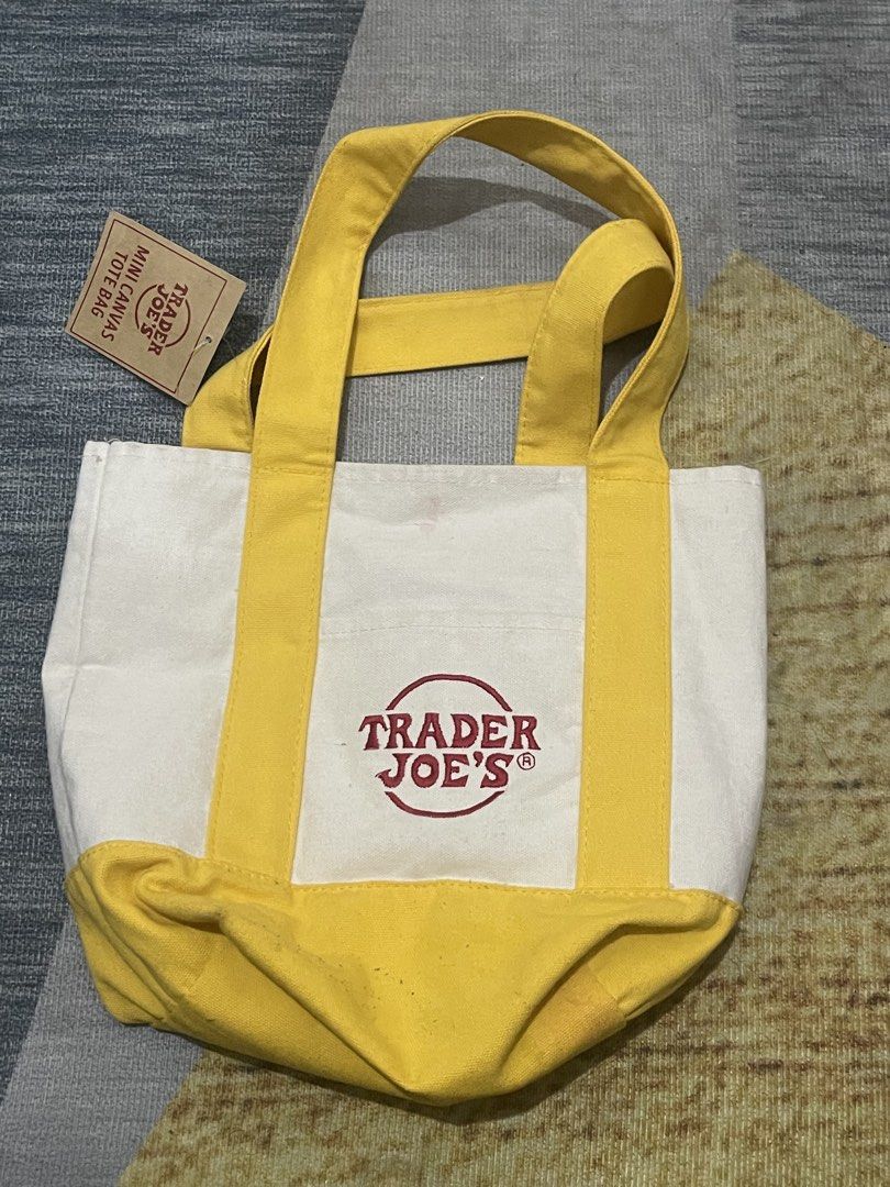 Trader Joe's Mini Canvas Tote Bag Yellow (Category: Tote Bags) located in Marikina City. Submitted by caseydreyes (Listing ID 1470228286, Image 2). Description: - brand new, bought this in the US! - issue: minimal pink mark on the second pic.