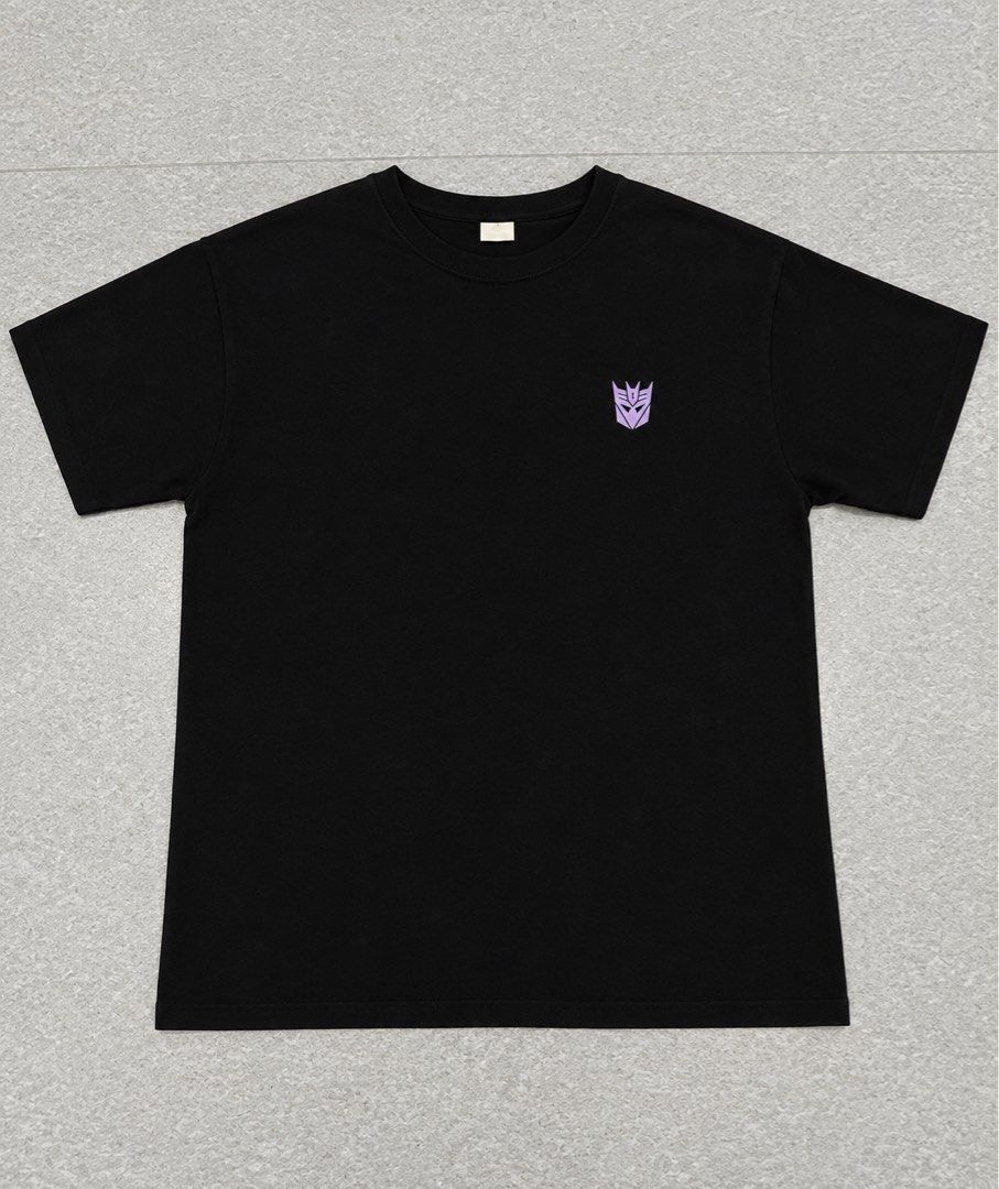 Transformers Megatron Graphic T-shirt Black (Category: Tshirts & Polo Shirts ) located in Manila. Submitted by fcaleb022713960 (Listing ID 1470228358, Image 1). Description: - Color: Black - Design: Small Decepticon logo on chest, large Megatron graphic with Japanese text and "Destroy Everything" lettering on the back - W 20 -L 25 - shipping fee to be shouldered by buyer.