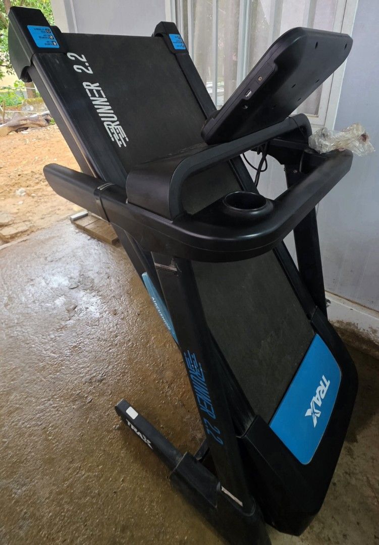 Trax Runner 2.2 Folding Treadmill (Category: Cardio & Fitness Machines) located in Subic. Submitted by kjespino17 (Listing ID 1470234957, Image 2). Description: - Model: Trax Runner 2.2 Electric Treadmill - Color: Black and Blue - Foldable deck design for easy space-saving storage - Digital display console to track your workouts - Convenient built-in cup holders on handlebars - Ideal for daily running and walking routines - Plug and go, ready to 