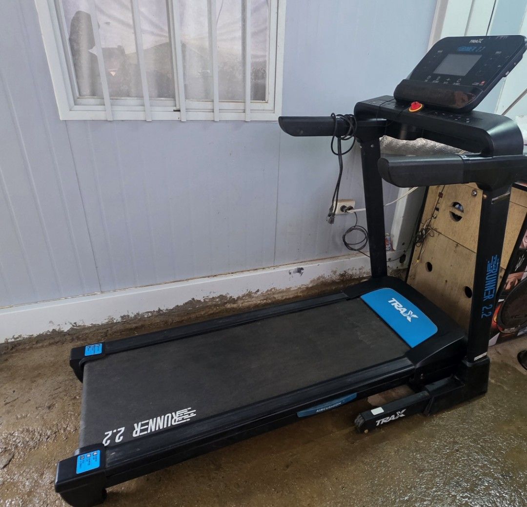Trax Runner 2.2 Folding Treadmill (Category: Cardio & Fitness Machines) located in Subic. Submitted by kjespino17 (Listing ID 1470234957, Image 1). Description: - Model: Trax Runner 2.2 Electric Treadmill - Color: Black and Blue - Foldable deck design for easy space-saving storage - Digital display console to track your workouts - Convenient built-in cup holders on handlebars - Ideal for daily running and walking routines - Plug and go, ready to 
