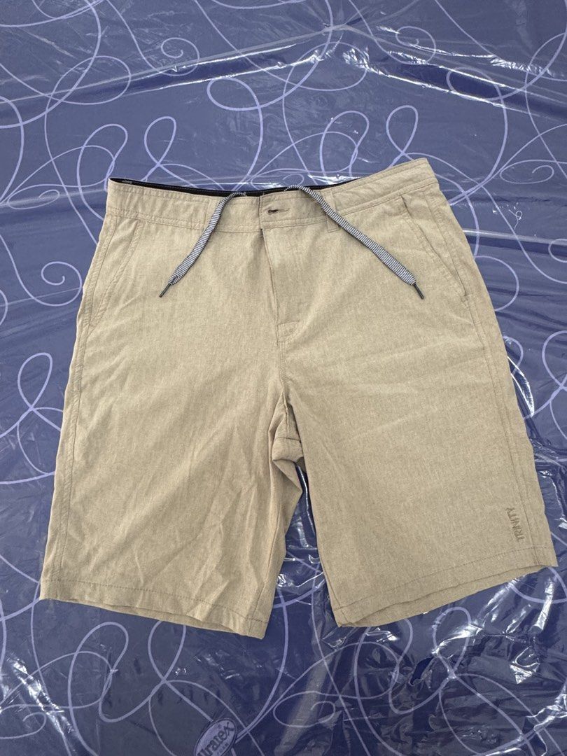 Trinity Hybrid Shorts Size 33 Beige (Pre-loved) (Category: Shorts) located in Santo Tomas. Submitted by toughu (Listing ID 1470145195, Image 1). Description: - Brand/Model: Trinity Hybrid Shorts - Color: Versatile Beige - Size: 33 waist - Material: 92% polyester, 8% spandex for superior flexibility - Features: Drawstring waistband, multiple pockets, and subtle textured look - Ideal for: Workouts, casual days, paddle out, and evening outings.