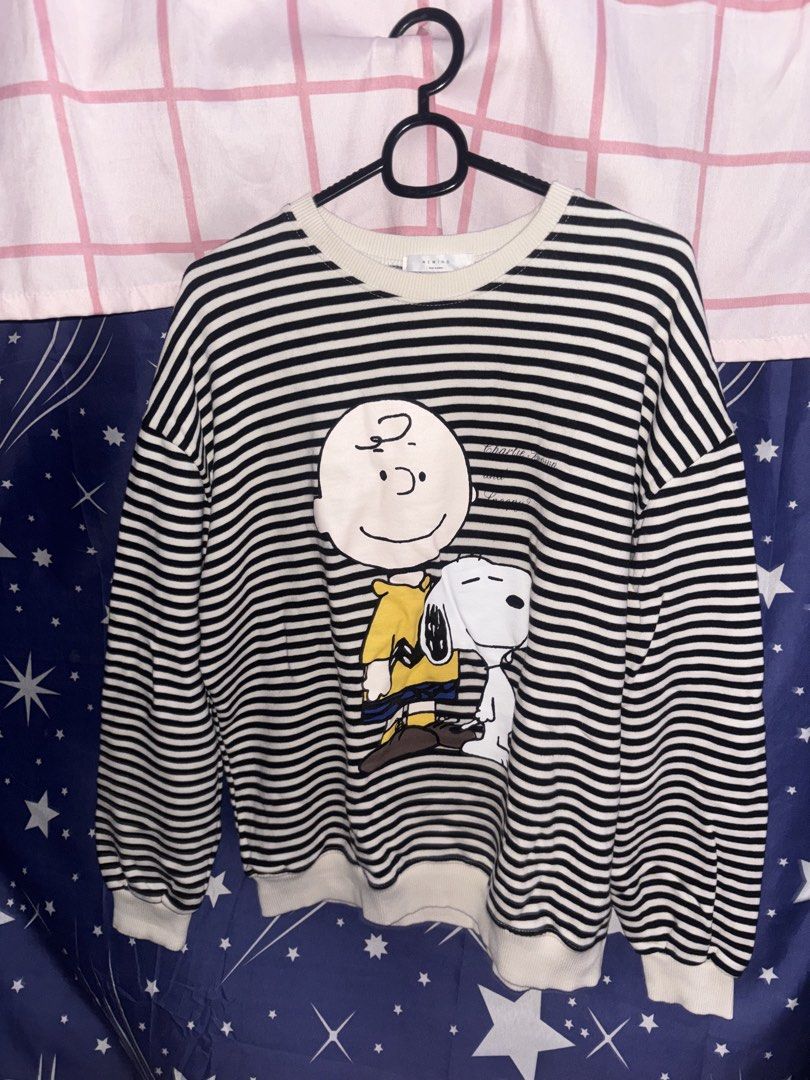 triped Sweatshirt (Category: Coats, Jackets and Outerwear) located in Manila. Submitted by leetrisha_lion (Listing ID 1470330647, Image 1). Description: - Design: Classic black & white stripes with large Charlie Brown & Snoopy graphic - Fit: Relaxed, dropped shoulder for ultimate comfort - Details: Soft off-white/cream ribbed collar, cuffs, and hem - Style: sweater, ideal for everyday casual wear - Condition: used but never abuse and ready to shi