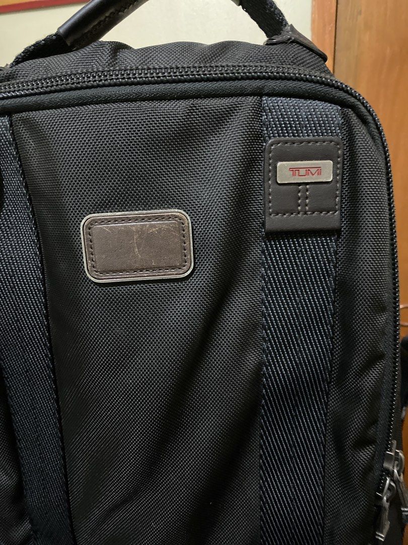 TUMI Alpha Bravo Backpack 222682HK2 (Category: Backpacks) located in Quezon City. Submitted by viber9163490242 (Listing ID 1470335045, Image 2). Description: - Authentic black TUMI backpack - Material: Durable ballistic nylon with premium leather trim - Organization: Multiple internal slip pockets, pen holders, and spacious compartments - Security: Metal TUMI Tracer plate with registration barcode and hotline - Comfort & Design: Structured top ha