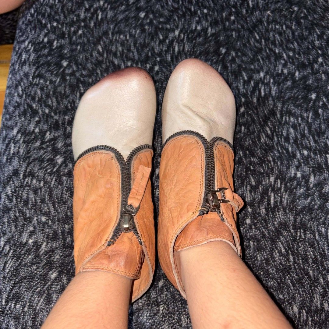 Two-tone leather ankle boots with front zip closure (Category: Boots) located in Manila. Submitted by youresovaiineee (Listing ID 1470260415, Image 2). Description: Size 39 - Honest issue: heel cover broken and missing sign of usage ❗️❗️ CAN NEGO ❗️❗️ ❗️❗️pm for more pictures ❗️❗️.