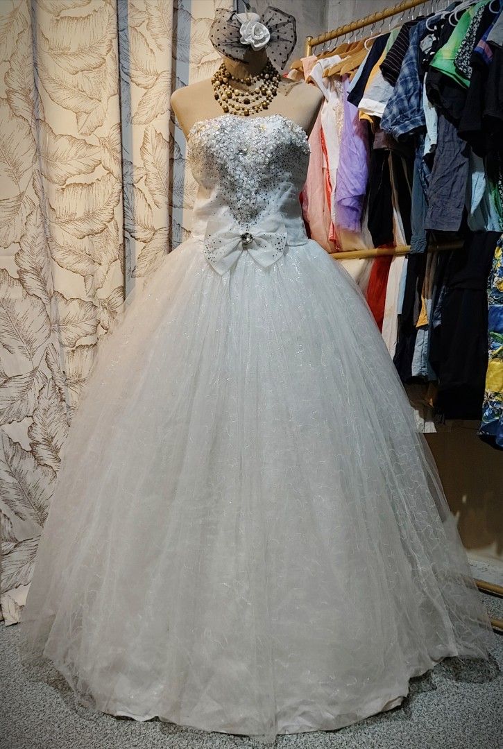 Ukay tube beaded wedding gown (Category: Evening dresses & gowns) located in Rizal. Submitted by villacorta14757 (Listing ID 1470202641, Image 2). Description: Ukay white tube beaded wedding ballgown B 36-42 W 34 L 58 Like new Padded Need wash may washable dirt and nanigas na glue 350+Sf #LegitOnlineSellerSince2020.