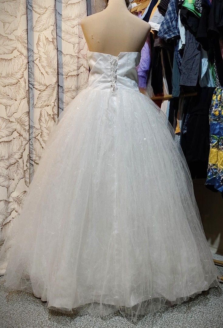 Ukay tube beaded wedding gown (Category: Evening dresses & gowns) located in Rizal. Submitted by villacorta14757 (Listing ID 1470202641, Image 3). Description: Ukay white tube beaded wedding ballgown B 36-42 W 34 L 58 Like new Padded Need wash may washable dirt and nanigas na glue 350+Sf #LegitOnlineSellerSince2020.