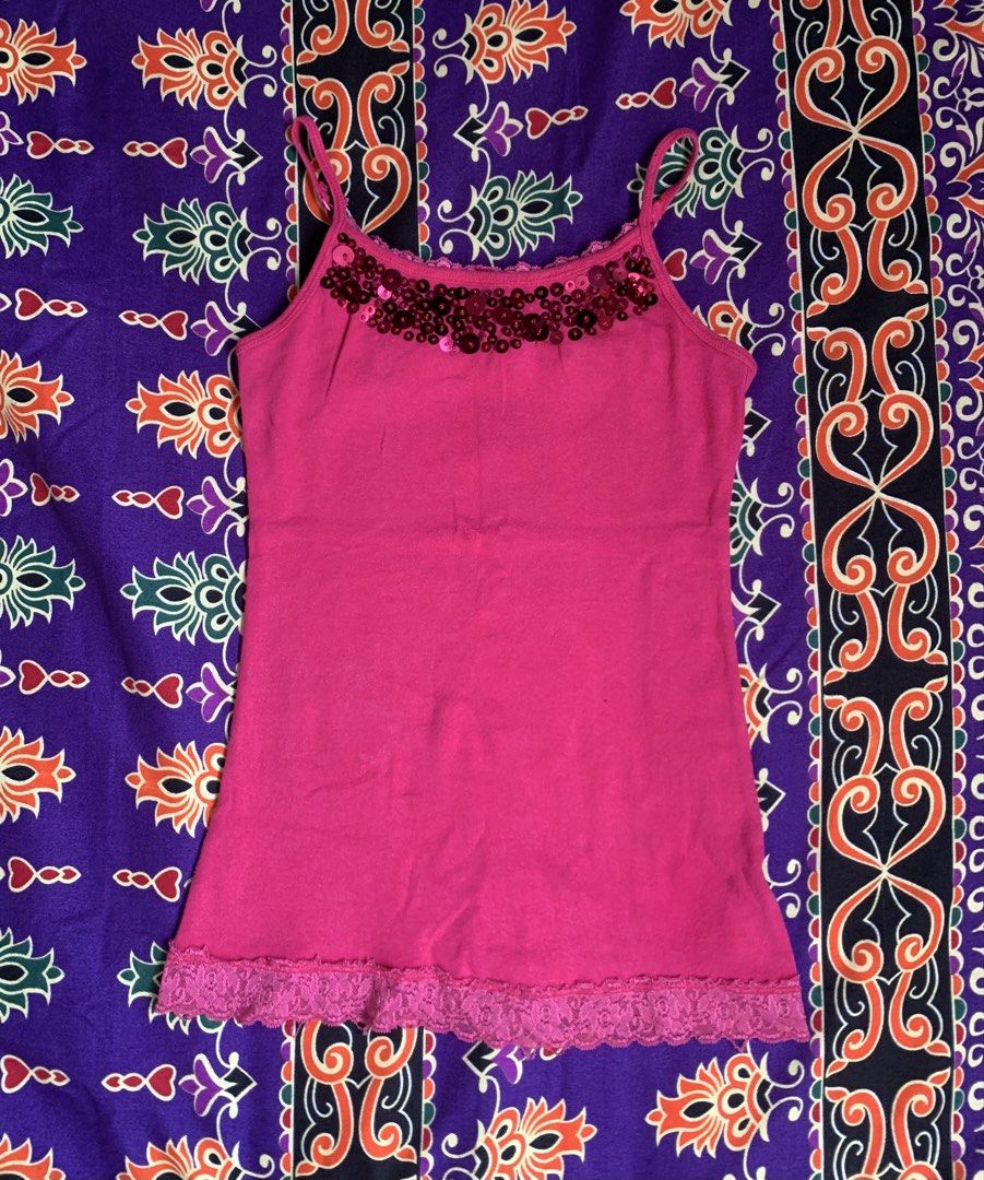 Ultimate Y2K / McBling Aesthetic Top Bundle (9 Pieces) – S-M (Category: Others Tops) located in Cebu City. Submitted by goldencloud_f1507d (Listing ID 1470240783, Image 1). Description: Overall Condition: All tops are in good, pre-owned condition with plenty of life left in them. They are clean and well-kept. Please note that the last sage green top has a minor issue with a few missing decorative dangling beads along the front trim. However, this
