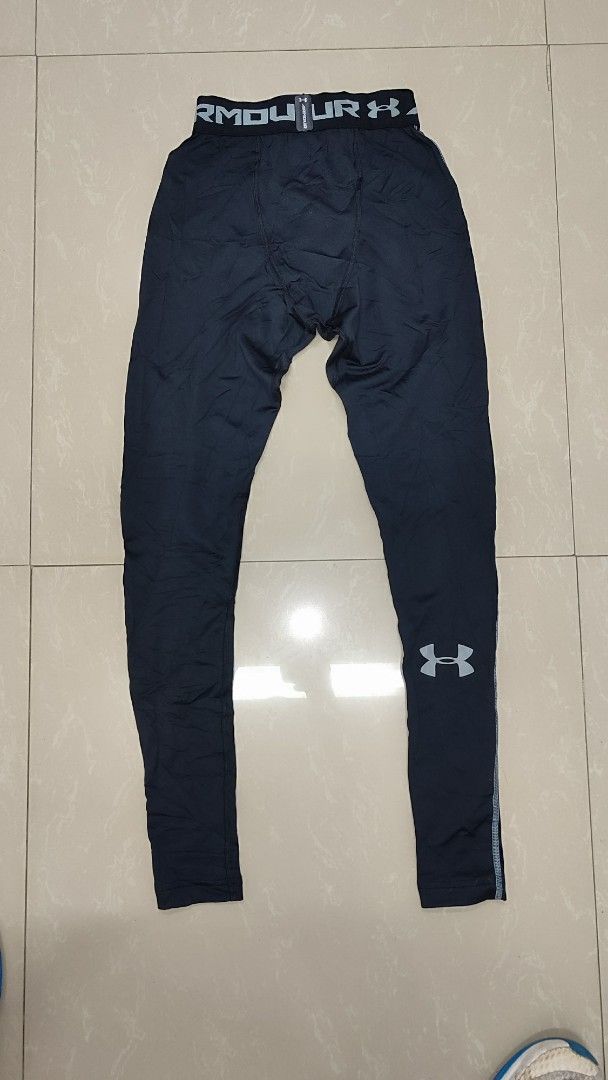 Under Armour ColdGear Compression Pants Size S Black (Category: Activewear) located in Manila. Submitted by cosmictree_1321 (Listing ID 1470218721, Image 1). Description: - Brand: Under Armour - Item: ColdGear Compression Pants - Color: Black - Size: S (165/70A) - Condition: Clean tag attached, ready to wear - Features: Elastic waistband with printed branding, fitted design, side seam details, and lower leg UA logo - Origin: Made in El Salvador -