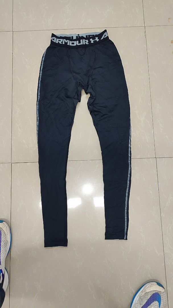 Under Armour ColdGear Compression Pants Size S Black (Category: Activewear) located in Manila. Submitted by cosmictree_1321 (Listing ID 1470218721, Image 2). Description: - Brand: Under Armour - Item: ColdGear Compression Pants - Color: Black - Size: S (165/70A) - Condition: Clean tag attached, ready to wear - Features: Elastic waistband with printed branding, fitted design, side seam details, and lower leg UA logo - Origin: Made in El Salvador -