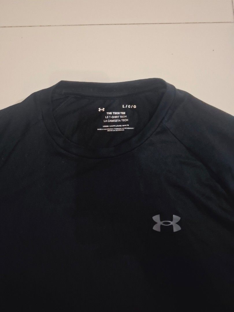 Under Armour shirt (Category: Activewear) located in Narvacan. Submitted by jigger85_2ndaccount (Listing ID 1470294547, Image 2). Description: under armour shirt like new no issue 9.7/10 condition bought in UK size : large dimes: 22 x 27 loc. ilocos sur.