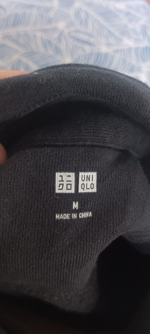 Uniqlo Black Half Zip Sweatshirt (Category: Coats, Jackets and Outerwear) located in Muntinlupa City. Submitted by thriftben (Listing ID 1470205028, Image 2). Description: - Brand: Uniqlo - Item: Half-zip sweatshirt - Color: Black - Size: Medium (M) - Material: Cotton and polyester blend - Hardware: YKK Vislon zipper at collar - Details: Ribbed cuffs and hem - Style: Classic streetwear, versatile for layering - Condition: Made in China.