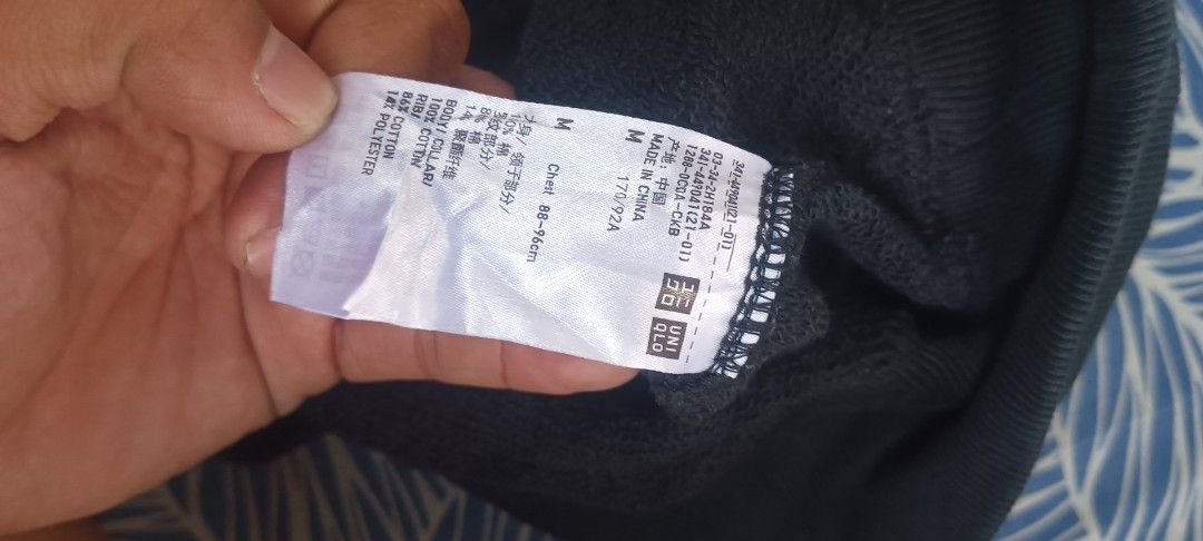 Uniqlo Black Half Zip Sweatshirt (Category: Coats, Jackets and Outerwear) located in Muntinlupa City. Submitted by thriftben (Listing ID 1470205028, Image 3). Description: - Brand: Uniqlo - Item: Half-zip sweatshirt - Color: Black - Size: Medium (M) - Material: Cotton and polyester blend - Hardware: YKK Vislon zipper at collar - Details: Ribbed cuffs and hem - Style: Classic streetwear, versatile for layering - Condition: Made in China.