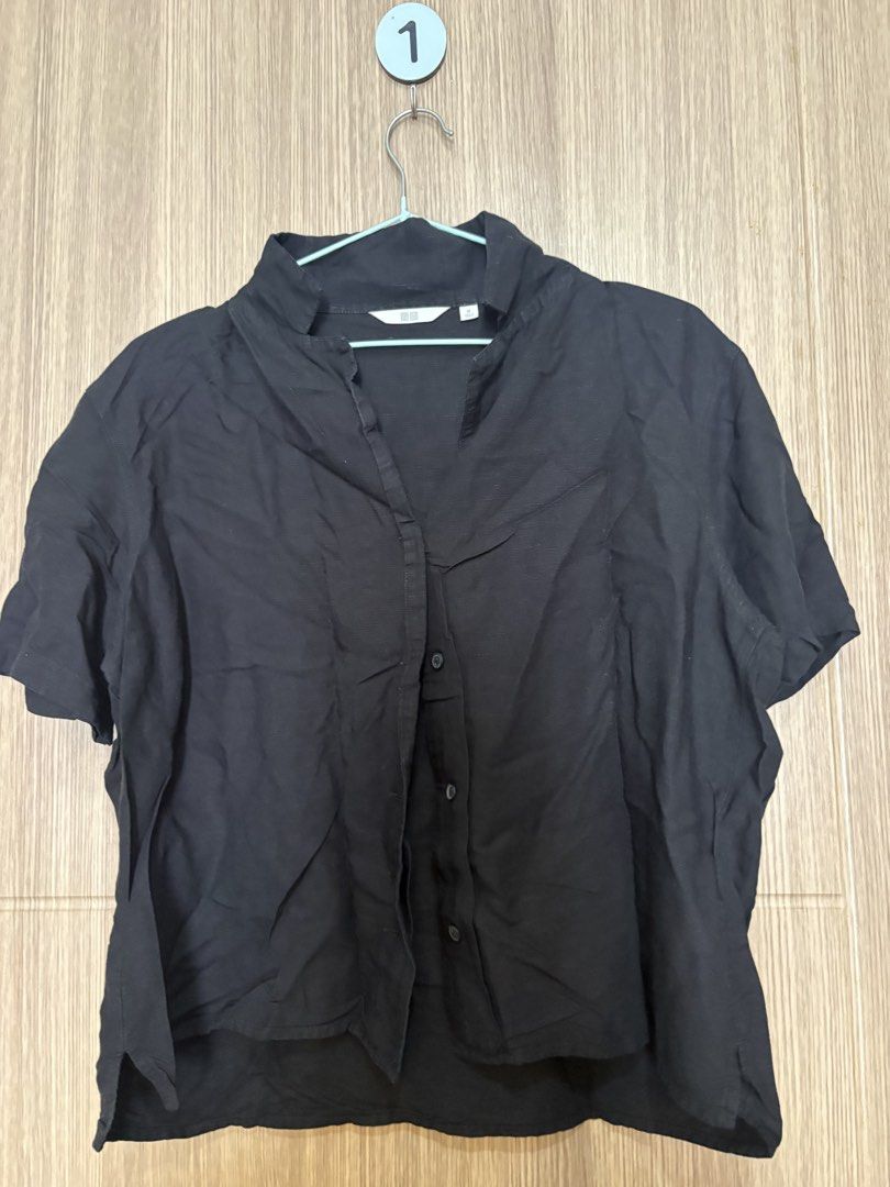 Uniqlo Black Short Sleeve Button Shirt (Category: Shirts) located in Pasay City. Submitted by curatedclearout (Listing ID 1470177876, Image 1). Description: - Brand: Uniqlo - Item: Short sleeve button-down shirt - Size: M (Made in China) - Color: Black (Dark colorway) - Fit & Details: Relaxed fit, collar design, slightly textured fabric - Versatility: Easy to match with pants or shorts, perfect for everyday casual wear.