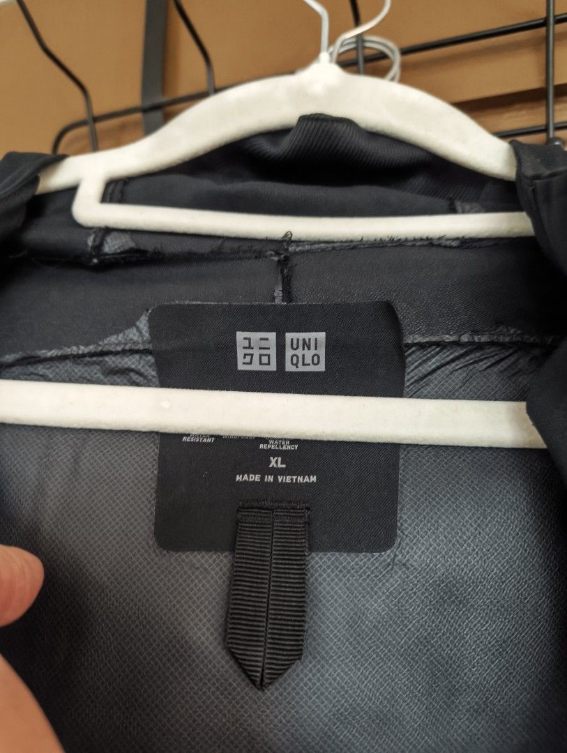 Uniqlo Blocktech (Category: Coats, Jackets and Outerwear) located in San Pedro. Submitted by madvillainkicks (Listing ID 1470155644, Image 3). Description: - Brand: Uniqlo - Size: XL - Color: Black - Origin: Made in Vietnam - Features: Water-repellent and windproof design - Details: Full zip front with a convenient chest pocket - Best for: Rainy or windy days as a great outer layer - Condition: Clean overall 25 x 28.
