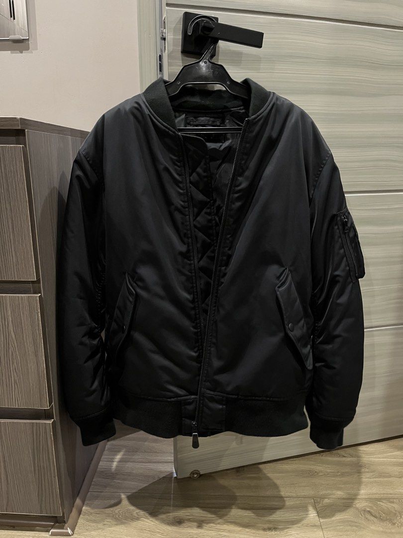Uniqlo Blouson (Category: Coats, Jackets and Outerwear) located in Cavite. Submitted by askingryan (Listing ID 1470312449, Image 1). Description: - Brand: Uniqlo - Style: Bomber Blouson / Jacket - Color: Black - Size: L - Condition: Excellent / Well-maintained - Features: Durable nylon shell, comfortable quilted inner lining, utility pocket on the left sleeve, sturdy front zipper, and secure snap-button pockets - Perfect for daily wear, travel, o