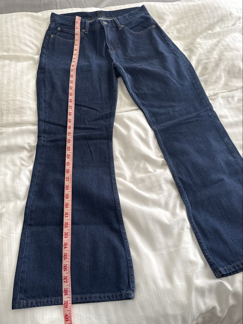 Uniqlo Boot Cut Dark Wash Jeans (Category: Jeans) located in Manila. Submitted by ramoneybaloney (Listing ID 1470229599, Image 3). Description: Size 27 but fits up to 30” waist Length - 30” Bought in Japan, tag removed but never used .